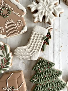 decorated christmas cookies on a white table