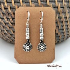 Earrings with silver and leather elements/boho dangle earrings/bohemian beaded earrings/dainty drop earrings/long ethnic earrings for women/handmade jewelry/gift for her/gift for mom/sister gift/girlfriend gift/summer jewelry/ethnic earrings Exquisite piece of handmade jewelry.  Bohemian accessory, boho jewellery, boho earrings. Gift for yourself, a dear friends, mom, sister, girlfriend, teacher... Materials used: Antique silver stainless steel details Genuine leather string For dimensions- please check pictures. This accessory comes in stylish jewelry pouch. It can be gift wrapped: Gift wrapping options:  1. Classic gift wrapping in recycled brown paper and natural string. Decorated with a matching themed charm.      Save time and add this wrapping to your basket at checkout for only £2.0 Nickel Free Bohemian Beaded Earrings For Everyday, Bohemian Nickel Free Beaded Earrings For Everyday, Nickel Free Bohemian Beaded Earrings, Dangle Earrings With Silver Beads For Festivals, Silver Beaded Dangle Earrings For Festivals, Festival Dangle Earrings With Silver Beads, Nickel-free Bohemian Beaded Earrings, Everyday Bohemian Nickel-free Beaded Earrings, Bohemian Beaded Earrings For Everyday