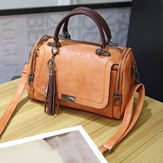 Color: BrownStrap Type: AdjustablePattern Type: PlainStyle: FashionableBag Size: MediumDetails: FringeMagnetic: NoType: Boston BagCoating: 100% PolyurethaneComposition: 100% PolyesterCare Instructions: Do not washMaterial:PU LeatherSize & Fit:Bag Length Bag Width Bag Height Handle Height Strap Length10.6 5.5 7.1 3.9 53.1 Korean Bag, Pu Leather Bag, Leather Handbags Women, Styl Retro, Casual Tote, Boston Bag, Leather Tassel, Styl Vintage, Fesyen Wanita