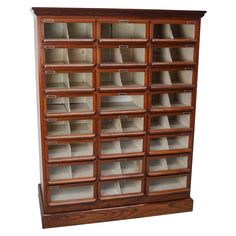 a large wooden bookcase with many drawers