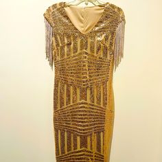 Women's Gold Designer Short Party Dress (Size-M) In Brand New Condition Fast Shipping Check Out My Other Listings, Bundle & Save Happy To Answer Any Questions! Don't Like My Price? Open To Reasonable Offers :) Thank You For Browsing My Closet! <3 Gold Evening Dress For Night Out, Festive Gold Evening Dress For Party, Glamorous Fitted Flapper Dress For Party Season, Glamorous V-neck Flapper Dress For Evening, Festive V-neck Evening Dress For Night Out, Elegant Fitted Flapper Dress For Festive Occasions, Glamorous V-neck Flapper Dress For Party Season, Gold Sequin Cocktail Dress For Holidays, Gold Sequin Holiday Cocktail Dress