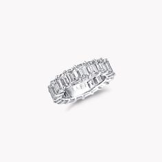 Creating a scintillating band of brilliance around the finger, the sculptural beauty of step cut diamonds is showcased in our emerald cut diamond and platinum wedding band. Available in a variety of different carat sizes, every wedding band receives Graff's exacting craftmanship and devotion, meticulously designed and impeccably handcrafted by our artisans in London. An elegant Classic Graff emerald cut diamond eternity band with a total weight of approximately 7.60 carats, showcasing 0.40 carat Shifting Jewelry, Emerald Cut Diamond Eternity Band, Royalty Dr, Diamond Shaped Engagement Ring, Modern Royalty, Graff Diamonds, Rare Diamond, 2024 Wishlist, Diamond Earrings Studs Round