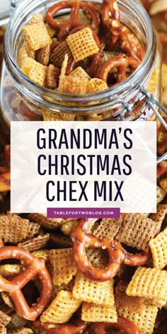 grandma's christmas chex mix in a glass jar with pretzels on top