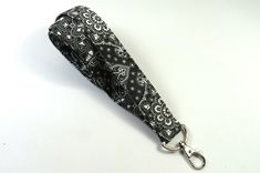 This cute lanyard has beautiful black and gray bandana design. It is perfect for any occasion. You can leave me a convoy if you need a different size. You can have a wardrobe of lanyard to match your outfit. This lanyard is made of soft 100% cotton fabric to give a comfortable feel around your neck. This lanyard is easy to take care. You can spot clean and throw in a washer and hang dry. If you want you can iron and it is ready to use. These lanyards are perfect if you have metal allergy. Each o Cute Lanyard, Black Bandana, Cute Lanyards, Patriotic Fabric, Fabric Lanyard, Bandana Design, Have Metal, Badge Holder, Badge Holders Lanyard