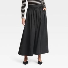 This Voluminous Maxi Skirt from A New Day™ makes a perfect pick whether you're headed to the farmers market or meeting friends for brunch. This voluminous maxi skirt is made from recycled polyester fabric for all-day comfort, while the full elastic waistband lends a secure fit. Tailored in a regular-rise silhouette for a charming look, you can pair this maxi skirt with your fave tops and footwear for versatile ensembles. A New Day™: Style that goes wherever you do. Maxi Black Skirt, Target Skirt, Meeting Friends, Skirt And Sneakers, Recycled Polyester Fabric, Business Attire, Bottom Clothes, Black Skirt, Casual Fits