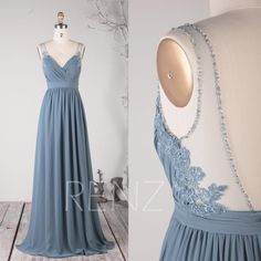 a dress on a mannequin with beaded details and blue fabric, in front of a white background