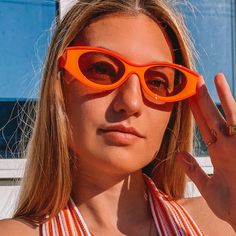 These Retro Fashion Sunglasses Are Such A Fun Touch To Any Outfit. Frames Are Bright Orange With Pink Arms And Light Orange Lenses. Comfortable Fit! Eye Size: 150mm Bridge Size: 20mm Frame Width: 70mm Frame Height 40mm Temple Length: 138mm Brand New! From My Boutique! Retro Plastic Cat Eye Sunglasses, Retro Cat Eye Sunglasses For The Beach, Summer Beach Cat Eye Sunglasses With Glass, Retro Glass Cat Eye Sunglasses For The Beach, Orange Retro Sunglasses For Party, Retro Glass Cat Eye Sunglasses For Beach, Glass Cat Eye Sunglasses For Vacation, Chic Orange Cat Eye Sunglasses, Fun Orange Tinted Sunglasses