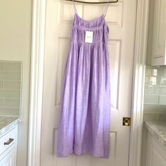 This Lovely Linen Summer Dress Is Brand New And Has Never Been Worn! All Tags Are Attached And It Is Ready To Ship And Wear! The Dress Drops To Below The Knee And Has A Flowy-Comfortable Feel! It Also Has A Simple Lining To The Knee, So You Do Not Have To Worry About The Dress Being ‘See Through!’ Linen Is Always A Perfect Choice For Summer And For Comfort- Dress Me Up With Heels Or Bring Me To The Beach Club For Apres Swim! This Item ‘Resides’ In A Smoke Free And Pet Free Home Purple Sundress Midi Dress For Summer, Purple Summer Sundress Midi Dress, Spring Lavender Sleeveless Midi Dress, Lavender Sleeveless Midi Dress For Spring, Summer Pleated Purple Maxi Dress, Purple Midi Length Sundress For Vacation, Purple Midi Dress For Summer Day Out, Summer Purple Pleated Dress, Spring Beach Lavender Dress