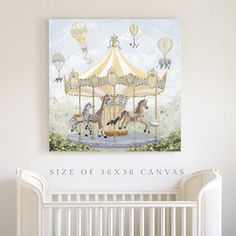 a baby's nursery room with an art piece on the wall and a white crib