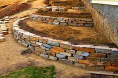 a stone wall with steps made out of bricks