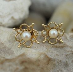 White 14k Gold Filigree Jewelry, Yellow Gold Pearl Earrings With Intricate Design For Gift, Elegant Earrings With Intricate Flower Design, Elegant Filigree Flower Earrings, White Filigree Earrings For Anniversary, Elegant Filigree Jewelry In Flower Shape, Elegant Filigree Flower Earrings For Wedding, Elegant 14k Gold Flower Earrings For Anniversary, Elegant Filigree Flower-shaped Jewelry