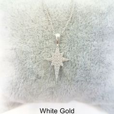 - North Star pendant necklace is made with high quality 14K real solid gold including the chain. - North Star necklace has decorated with white zirconia stones. - This charm, dainty , delicate and trendy north star necklace has been artfully designed for timeless fashion. - You receive north star jewelry in a beautiful and free gift box. - Free shipping (Arrive within 4 business days to USA and Canada ( 1 day for production+3 days for shipment)) - This 14K solid gold north star necklace is a per Star-shaped Diamond White Necklace For Anniversary, Diamond White Jewelry With Star Charm For Gift, Diamond White Star Of David Jewelry Gift, Sterling Silver Necklaces With White Star Charm, White Sterling Silver Necklace With Star Charm, White Star Of David Jewelry For Anniversary, White Sterling Silver Star Of David Jewelry, Gift White Gold Necklace With Star Charm, White Gold Necklace With Star Charm As Gift