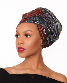 The Classics Authentic Ankara head wrap can be worn with matching colors or wherever your imagination takes you. Made of 100 % cotton and machine washable. Measures 22" x 72" Made in Nigeria. Black Bohemian Headwrap For The Beach, Adjustable Multicolor Traditional Headwrap, Multicolor Cotton Headscarf, Traditional Adjustable Multicolor Headwrap, Adjustable Black Bohemian Headwrap, Black Bohemian Headwrap In Headband Style, Multicolor Cotton Bandana For Beach, Multicolor Headwrap For Beach, One Size Fits Most, Bohemian Cotton Headwrap For Festivals