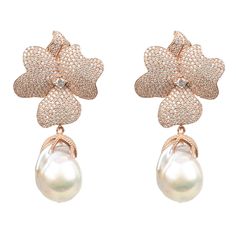 Ideal for those who love statement jewelry make these floral inspired earrings the finishing touch for any special occasion outfit.  The flower tops are adorned with baroque pearls which change in the light with their iridescence  Pierced earrings with post back and butterfly fastening.  Materials: 925 sterling silver, dipped in 22ct rosegold. AAA grade cubic zirconia. Baroque pearls  Style Notes: Perfect worn with evening wear, at a cocktail party or any black tie event. White Flower Earring, Pearl Drop Earrings Gold, Occasion Outfit, Flower Drop Earrings, Girl Things, Nature Inspired Jewelry, Flower Tops, Drop Earring, Online Jewelry Store