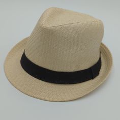 Levi's 'Natural' Cream Colored Black Accent Ribbon Shell: 100% Paper Lining: 100% Polyester Style: Trilby Perfect Hat For Summertime! Great For Garden Parties, Boating, Or The Beach! Size S/M New With Tags (Nwt) Never Worn. Unisex Approximate Measurements In Inches: 9" Wide X 11" Long X 5" Tall (At Crown) 1.75" Brim Please Ask Any Questions You May Have. Thanks For Shopping With Brett & Jules! Classic Summer Fedora In Solid Color, Classic Beige Hat Bands For Spring, Classic Cream Straw Hat For Spring, Classic Cream Fedora For Vacation, Classic Cream Hat Bands For Summer, Casual White Straw Hat Bands, Classic Cream Fedora For The Beach, Classic Cream Fedora For Beach, Beige Fedora Panama Hat For Spring