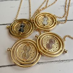 Hello! This Is A Listing For A Time Turner Necklace, The Pendant Is 2 Inches Across 1.5 Inches Top To Bottom, The Chain Is 24 Inches. Made Of Alloy Metal, The Rings Fully Rotate And The Sand Is Fluid. Engraved Around The Rings Are The Words “ I Mark The Hours, Every One, Nor Have I Yet Outrun The Sun.” Time Turner Necklace, Time Turner, The Hours, The Rings, The Sand, Womens Jewelry Necklace, The Sun, Jewelry Necklaces, Womens Sizes