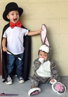 two children dressed up in costumes for halloween