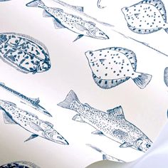 a wallpaper with fish on it in blue and white