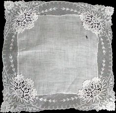 New old stock vintage wedding hanky with a fancy applique and lace border. Although never used, this hanky is slightly imperfect. Please view all photos, as you will see a couple of very small tears in the lace and a small tear in the linen center. Still very pretty, and perfect for a bride-to-be as her something old. All white, measuring 11 inches, and made of linen. Being sold AS IS, and priced accordingly. White Victorian Handkerchiefs With Lace Trim, White Victorian Handkerchief With Lace Trim, Victorian White Handkerchiefs With Lace Trim, Lace Handkerchiefs With Lace Trim For Wedding, Lace Wedding Handkerchiefs With Lace Trim, Lace Wedding Handkerchiefs With Lace Work, Wedding Lace Handkerchief With Lace Work, Wedding Handkerchiefs With Lace Work, Vintage Lace Trim Handkerchiefs For Wedding