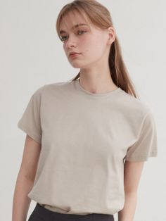 Editor's Notes The short sleeve shirt has a round neckline and a standard fit.- Cotton fabric with excellent durability and flexibility- Ribbed neckline to minimize stretching- Wear all year roundMeasurements(in.)ONE SIZE- Chest: 18.11 in. - Shoulder: 14.57 in. - Sleeve Length: 6.5 in.  - Armhole: 7.87 in. - Bottom Hem: 17.32 in. - Total Length: 21.46 in.*The exact size may vary by 0.39 - 1.18 in. depending on the method of measuring Model info: Height 5' 7''Composition & Care-&nbs Simple Beige Top For Everyday, Simple Everyday Beige Top, Beige Short Sleeve T-shirt, Classic Short Sleeve T-shirt, Basic Beige Crew Neck T-shirt, Classic Beige Relaxed Fit T-shirt, Beige Relaxed Fit Classic T-shirt, Simple Cropped T-shirt With Short Sleeves For Everyday, Simple Short Sleeve Cropped T-shirt For Everyday