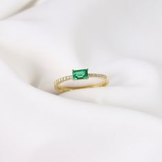 Your Gold Emerald Ring is stylish, dainty and pretty ideal for everyday use. Details of solid gold handmade Minimalist Emerald Jewelry are very eye-catching. It is a great gift for your loved ones. This jewelry will be an indispensable piece of yours. This meaningful 18k May Birthstone Ring with high quality handwork will be a legacy you can leave to your family its. * Emerald Ring Details * Material / Gold Kt : This elegant ring is made of 14k and 18k Solid Gold * Available Gold Colors : Yellow Dainty Emerald Ring With Prong Setting, Dainty Emerald Stackable Rings, Dainty Stackable Gemstone Rings, Elegant Green Midi Rings For Anniversary, Minimalist Green Diamond Ring For Wedding, Minimalist Green Diamond Wedding Ring, Wedding Ring Emerald, Minimalist Wedding Ring, Emerald Promise Ring