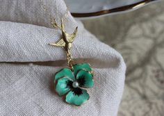 Flower Necklace Pansy Necklace Green Necklace Small by madebymoe, $48.00 Green Vintage Charm Jewelry Gift, Green Vintage Charm Jewelry For Gift, Elegant Enamel Jewelry With Vintage Charm, Elegant Vintage Enamel Jewelry With Charm, Vintage Pierced Enamel Jewelry, Vintage Pierced Jewelry As Gift, Vintage Pierced Jewelry For Gift, Vintage Turquoise Enamel Jewelry, Silver Vintage Charm Earrings For Gift