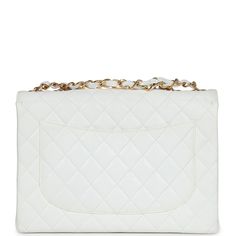 This Chanel Jumbo classic single flap bag is in white caviar leather with gold tone hardware and features a front flap with signature CC turnlock closure, half moon back pocket, and adjustable interwoven gold tone chain link and black leather shoulder strap.The interior is lined in white leather and has one zip pocket with a CC pull and a slip pocket underneath.Collection: 5-series (1997-1999)Origin: FranceCondition: Vintage; Excellent - This bag retains its shape. Some light scratching to the hardware. The shoulder strap leather shows some signs of wear with minor discoloration. The exterior leather shows no signs of wear. The interior leather is clean with no press marking or wear and date stamp sticker is still intact.Accompanied by: Chanel dustbag, carebook, COA cardMeasurements: 11.5" Classic White Double Flap Bag, Luxury White Double Flap Bag, White Evening Bag With Double Flap, White Double Flap Evening Bag, White Double Flap Formal Bags, Elegant White Double Flap Shoulder Bag, Classic White Bag With Cc Turnlock Closure, Chic White Double Flap Shoulder Bag, White Luxury Flap Bag With Gold-tone Hardware