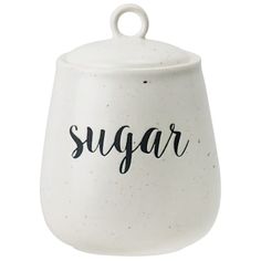 a white sugar jar with the word sugar written in cursive writing on it