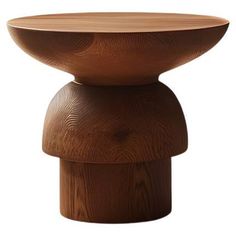 the wooden table is made from wood and has a circular top that matches it's base