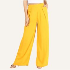 These "Sunshine Yellow Wide-Leg Trousers" Are A Vibrant Addition To Your Wardrobe, Perfect For Making A Bold Fashion Statement. The Trousers Feature A High-Waist Design And A Fluid Wide-Leg Cut That Creates A Flattering Silhouette For All Body Types. The Bright Yellow Color Captures The Essence Of Summer And Is Sure To Brighten Up Any Ensemble. Made With A Comfortable, Breathable Fabric, These Pants Are Not Only Stylish But Also Offer Ease Of Movement, Ideal For Both Casual And Dressy Occasions. Chic Yellow Bottoms With Elastic Waistband, Yellow Wide Leg Bottoms With Elastic Waistband, Yellow Wide Leg Pants With Elastic Waistband For Summer, Yellow Wide-leg Pants With Elastic Waistband, Yellow Wide Leg Pants With Elastic Waistband, Yellow Wide-leg Pants For Spring, Chic Yellow Pants With Elastic Waistband, Fitted Yellow Pants For Vacation, Spring Yellow High Waist Wide Leg Pants