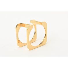 This is part of Chairish’s Costume Jewelry assortment.  This dynamic and sculptural cuff bracelet is modernist and architectural all at the same time. It is gold plated and from the 80's. Upside down, it looks like an inverted U. It slips on the wrist and will fit a small to small medium wrist. It will only go over a wrist size of 5.5 or 6". The two bars on top are linear with a angled pattern on the corners as shown in the photos and the bottom is where the other two bars are perpendicular. It Modern Gold-tone Rings With Polished Finish, Modernist Gold Bangle Bracelets, Modern Yellow Gold Metal Cuff Bracelet, Modern Gold Open Ring Jewelry, Modern Gold Open Band Jewelry, Modern Gold-tone Open Ring Jewelry, Contemporary Rectangular Gold Jewelry, Modernist Geometric Jewelry For Formal Occasions, Modern Gold-tone Rings For Formal Occasions