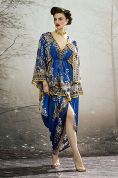 Blue silk peplum tunic with all over regal floral prints. - Aza Fashions Silk Floral Print Party Kaftan, Elegant Floral Print Tunic Kaftan, Silk Printed Dress For Eid, Blue Silk Dress With Digital Print, Blue Bohemian Dress With Traditional Drape, Elegant Blue Floral Print Kaftan, Bohemian Floral Print Evening Kaftan, Bohemian Dress With Floral Print And Traditional Drape, Rajdeep Ranawat