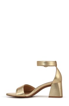 A belt ankle strap sets the tone as it secures the fit of this flared-block-heel sandal cushioned with Naturalizer's Contour+ Comfort technology. 2 1/2" heel Adjustable ankle strap with buckle closure Cushioned footbed Leather upper/synthetic lining and sole Imported Adjustable Ankle Strap Block Heels With Buckle, Gold Ankle Strap Heels With Stacked Heel, Gold Sandals With Stacked Heel Medium Width, Gold Sandals With Stacked Heel And Medium Width, Adjustable Gold Block Heels, Gold Block Heel Sandals Medium Width, Adjustable Ankle Strap Gold Heels, Gold Ankle Strap Sandals With Sculpted Heel, Gold Sandals With Ankle Strap And Sculpted Heel