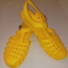 Women's Retro Jelly Rubber Buckle Closure Sandals Bright Yellow Sz 11 Comes From Smoke Free Home All Items Are Kept In A/C Never Used Kept In Storage Retro Jellies In Bright Yellow Shade Pvc Rubber Material Buckle Closure Will Be Mailed Without Box Measures Approximately Sz 11 Toe To Heel 10.75" L Retro Closed Toe Sandals For Summer, Retro Summer Sandals With Flat Heel, Retro Closed Toe Sandals For Beach, Retro Summer Flat Heels, Retro Sandals With Buckle Closure For Summer, Retro Summer Sandals With Buckle Closure, Retro Flat Beach Sandals, Closed Toe Jelly Sandals With Buckle For Beach, Beach Jelly Sandals With Buckle Closure