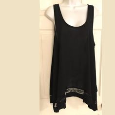 This Is An Awesome Cherish Blouse Tunic Tank Top Shirt. It Has A Semi Sheer Black Material, Lace Inset Detail And An Asymmetric Shark Bite Hem. Looks Super Cute With Cutoff Shorts! I Have This In Blue & Yellow Also (Last Pic), Different Post. Size: Large Bin J119 Black Sleeveless Blouse For Day Out, Flowy Black Top For Layering, Sleeveless Black Blouse For Day Out, Casual Tank Blouse For Night Out, Black Lace Trim Blouse For Layering, Black Lace Trim Blouse For Daywear, Black Flowy Summer Blouse, Black Sleeveless Blouse For Daywear, Summer Black Daywear Tops