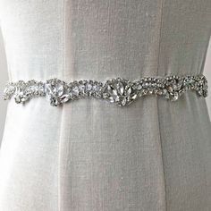 This clear and sparkling rhinestone trim , looks more beautiful in person! you can trim short ,it is better cut with the line of rhinestone,which is nice pieces on any craft projects Fine workmanship ,beautiful and in delicacy, the crystal patch can arranged by your own . the beautiful applique can be made in nice neckline collar ,bridal gloves, wedding garters, bridal veil,costumes belt,crafting any sort of stuff. appliques for clothes, dress, hat, garment clothing. Perfect for wedding dresses Elegant Silver Bedazzled Bridal Accessories, Elegant Bedazzled Silver Bridal Accessories, Elegant Embellished Crystal Bridal Belt, Crystal Bridal Accessories For Wedding, Bedazzled Crystal Bridal Belt For Wedding, Silver Rhinestone Bridal Accessories For Formal Occasions, Crystal Bedazzled Bridal Belt For Wedding, Silver Crystal Bridal Belt For Wedding, Formal Silver Bridal Accessories With Rhinestones