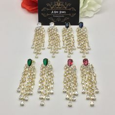 Sparkle and shine like never before with the range of cubic zirconia drop dangle tassel earrings women wedding bridal jewellery. Earrings for pierced ears. Handcrafted item with AAA cubic zirconia stone. Main Colour: Gold CZ Stones Colour: Clear White, Emerald Green  These earrings are too glamorous and sparkling. It is a must have piece in your jewellery collection. Pearl Drop Cubic Zirconia Earrings For Party, Dangle Crystal Earrings With Plating For Party, Party Dangle Crystal Earrings With Plating, Party Crystal Dangle Earrings With Plating, Party Pearl Drop Chandelier Earrings In Cubic Zirconia, Cubic Zirconia Dangle Earrings For Celebration, Party Chandelier Earrings With Pearl Drop And Cubic Zirconia, Jeweled Dangle Pearl Earrings For Parties, Sparkling Dangle Crystal Earrings For Celebrations