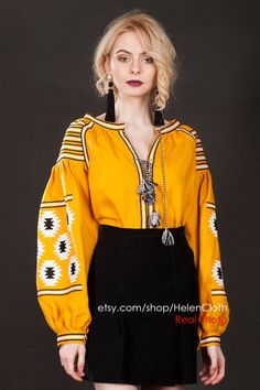 Mexico Embroider Shirt, Linen Mustard Blouse, Ethnic Clothing Plus Size For Woman, Ukrainian Vyshyvanka Top, Bohemian Broderie Mexicaine This blouse made from mustard linen fadric, with white and black embroidery. It has 2 pairs of tasselsl on the neckline. We can produce this blouse with the different colors of linen fabric. Also you can choose the color of embroidery. Write to me and ask about the availability of color that you want. Material: 100% linen. Many colors of fabric and color combin Fall Folk Peasant Top With Intricate Embroidery, Spring Folk Blouse With Woven Motifs, Bohemian Blouse With Woven Motifs For Festivals, Folk Style Tunic Blouse For Fall, Bohemian Long Sleeve Blouse With Woven Motifs, Bohemian Blouse With Woven Motifs And Long Sleeves, Traditional Multicolor Embroidered Peasant Top For Fall, Traditional Embroidered Tunic Peasant Top, Traditional Fall Peasant Top With Multicolor Embroidery