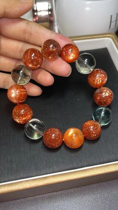 Material:  Arusha sunstone and green Beryl beads  size :  16mm hole size 1mm   quantity: one strand  6mm approx 29 pcs one strands 7mm approx25 pcs one strands 8mm approx 22 pcs one strands 9mm approx 21pcs one strands 10mm approx 19 pcs one strands 11mm approx 18pcs one strands 12mm approx 16 pcs one strands 13mm approx 16 pcs one strands 14mm approx 15 pcs one strands 15mm approx 14pcs one strands 16mm approx 14 pcs one strands 17mm approx 13pcs one strands 18mm approx 13pcs one strands 19mm approx 12pcs one strands 20mm approx 12pcs one strands PLEASE NOTE: 1.Due to lighting effects, monitor's brightness/contrast settings etc, there could be some slight differences in the color tone of the pictures and the actual item. 2.Each piece of natural crystal is unique, the imperfections add nat Orange Gemstone Beaded Bracelets With Round Beads, Orange Gemstone Beaded Bracelets, Spiritual Orange Crystal Bracelet With Round Beads, Unique Orange Gemstone Beads, Stone Energy, Handmade Multicolor Carnelian Beads, Gems, And Cabochons, Amber Agate Hand-strung Beads, Luxury Orange Beads, Gems, And Cabochons For Gift, Arusha