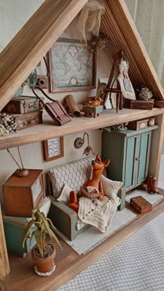 a doll house with furniture and accessories in it