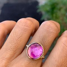 Shades of magenta and hot pink run through this tourmaline set in 14k yellow gold with brilliant white diamonds. Finished with Emily's handmade seagrass band in 14k yellow gold. Approximate stone size: 15.5m x 14.5mm Approx ct weight: 5.8cts Mohs Hardness: 7-7.5 This one of a kind piece is handmade to order in Emily's Hudson Valley studio. If you have questions about sizing, shipping or need help deciding please reach out to us! Shades Of Magenta, Pink Run, Stacked Engagement Ring, Birthstone Stacking Rings, Ombre Pink, Local Jewelry, Diamond Shop, Deep Pink, London Blue Topaz