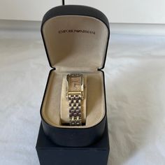 Emporio Armani Women’s Watch In Silver/Light Pink One Size. New. Adjustable. Smoke Free Home. Fast Shipping. Nwb Timeless Gold Watch With Palladium Hardware, Designer Gold Watches For Everyday Luxury, Luxury Watch With Stainless Steel Clasp As Gift, Designer Automatic Watches As Gift, Luxury Stainless Steel Clasp Watch As Gift, Gift Watches With Stainless Steel Clasp And Round Dial, Elegant Rectangular Analog Jewelry And Watches, Designer Yellow Gold Watch For Gift, Designer Jewelry With Rectangular Dial For Formal Occasions