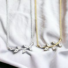 Why Us? 🌸   Free & Fast Shipping 📦 30-Day Moneyback Guarantee ✔️ Elegant & Aesthetic ⭐ Beautiful Japanese Atmosphere 🌠 Introducing our Beautiful Leaf Jewel Necklace 🍃💎. Crafted with exquisite detail and inspired by the natural beauty of leaves, this stunning piece features a delicate leaf-shaped pendant adorned with shimmering jewels. Each jewel reflects the light, creating a mesmerizing sparkle that catches the eye. The intricate design and timeless elegance make it a perfect accessory for Dainty Silver Plated Charm Necklaces, Elegant Silver Charm Necklace, Elegant Silver Plated Charm Necklaces, Elegant Crystal Necklace With Silver Chain For Gift, Silver Plated Pendant Charm Necklace, Elegant Gold Crystal Necklace For Her, Elegant Gold Crystal Necklace As Gift For Her, White Gold Pendant Crystal Necklace For Gift, White Gold Crystal Pendant Necklace For Gift