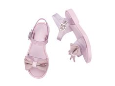 Meet the Mini Melissa Mar Sandal. This sweet sandal donned with a glittery bow appliqué is the ultimate fusion of comfort and cuteness for wherever your mini goes. With an adjustable buckle closure and Grenflex insole, she can wear these all day long without worrying about tired feet. Mini Melissa, Ballet Flats, Best Sellers, Marc Jacobs, Shop Now, Buckle, Sandals, Pink