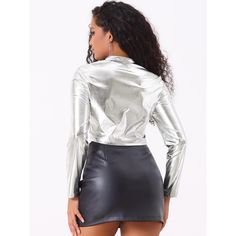 Crafted from metallic fabric, this jacket catches the light and adds a touch of shimmer to your outfit. The metallic finish gives it a luxurious and eye-catching appeal. The stand collar design adds a modern and sleek element to the jacket. It accentuates your neckline and creates a bold and confident look. The Stand Collar Jacket is the perfect choice for any party or club night. Pair it with your favorite figure-hugging dress or opt for high-waisted pants and a crop top for a chic and fashiona Womens Tailored Suit, Stand Collar Jacket, Stand Collar Jackets, Metallic Fabric, Women's Jackets, Woman Standing, Collar Designs, Down Vest, Tailored Suits