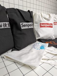 Satoru Gojo peeker canvas tote bag. Black Cotton Canvas School Bag, Casual White Shoulder Bag With Graphic Print, White Rectangular Shoulder Bag For Streetwear, Graphic Print Canvas Bag For School, Rectangular Graphic Print Canvas Bag For School, White Letter Print Bags For Streetwear, White Cotton Shoulder Bag With Letter Print, Rectangular Canvas Bags For Streetwear, Canvas School Bag With Graphic Print