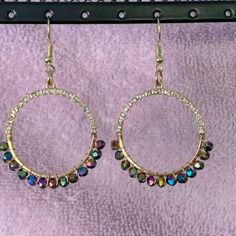 Pretty Gold Circles With Crystals On Top Half & Iridescent Crystals On Bottom On Nickel Free Gold Wires Iridescent Round Jewelry With Ear Wire, Rainbow Dangle Metal Earrings, Nickel-free Crystal Earrings For Party, Nickel-free Round Crystal Earrings For Party, Rainbow Round Earrings For Party, Round Metal Beaded Earrings For Party, Party Round Beaded Earrings In Metal, Party Metal Beaded Round Earrings, Iridescent Sparkling Earrings