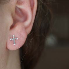 These minimalist dainty cross  earrings can be worn with any occasion. They are made of Sterling Silver. ~ Details ~ Backings: butterfly  Front: 10mm Solid Silver Cross Shape. Minimalist Cross Earrings For Gift, Minimalist Hypoallergenic Cross Earrings, Cross Shape, Cartilage Earrings Stud, Cross Earrings Studs, Minimalist Earrings Studs, Geometric Studs, Halo Earrings, Tiny Stud Earrings