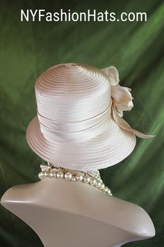 "Ladies Classic Champagne Beige Custom Made Slant Abstract Stylish Down Brim Satin Formal Designer Fashion Hat. This Elegant Dress Hat Is Embellished With A Large Satin Decorative Bow Embossed With Delicate Small Acrylic Rhinestones Throughout The Bow.  Crown Measures 22.5\". Standard Sized Fits Most Women Condition Is New Custom Made This Formal Champagne Beige Hat Is Suited For Weddings, Formals, Church, Shabbat, Mother Of The Bride Or Groom, Formal Special Occasion Events And Holidays. All Sa Church Lady Hats, Bespoke Hats, Large Brim Hat, Royal Ascot Hats, Veiled Hats, Formal Occasion Dress, Beige Hat, Couture Hats, Gold Hats