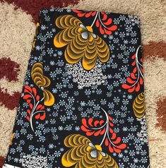 This black and gold African Fabric is high quality African print made from 100% cotton and it's 45 inches wide. It is used for making African Clothing, African quilts, & For Home decoration. FYI: Print is Double sided. The listing is for 1, 6 yards and Headwrap Each piece of fabric measures: 36in by 45in for 1 yard 216in by 45in for 6 yards 70in by 22in for Head wrap If you purchase more than one yard, you will receive one continuous piece. *If you require more than what I have listed, feel free Black Printed Cotton Patterns, Black Ankara Fabric With Batik Print, Black Ankara Fabric With Traditional Patterns, Black Fabric With Traditional Patterns, Traditional Black Fabric With Traditional Patterns, African Headwrap, African Quilts, Clean And Press, Hot Iron